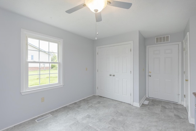 256 Sutton Ln, Lancaster, KY 40444 - unfurnished bedroom with a closet, baseboards, and a ceiling fan