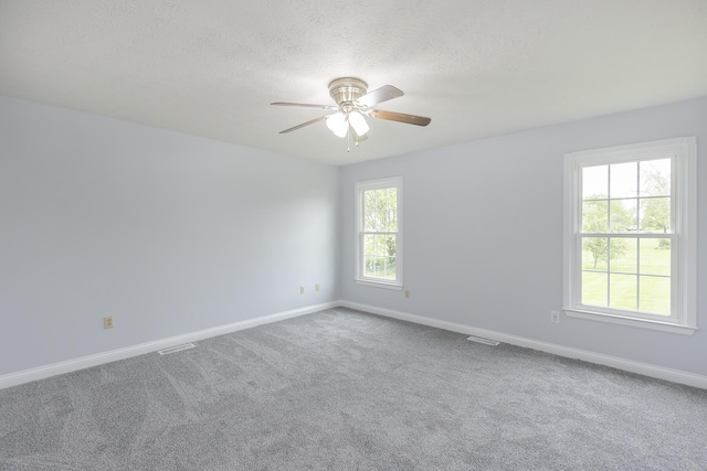 256 Sutton Ln, Lancaster, KY 40444 - empty room featuring baseboards, a ceiling fan, carpet, and a textured ceiling