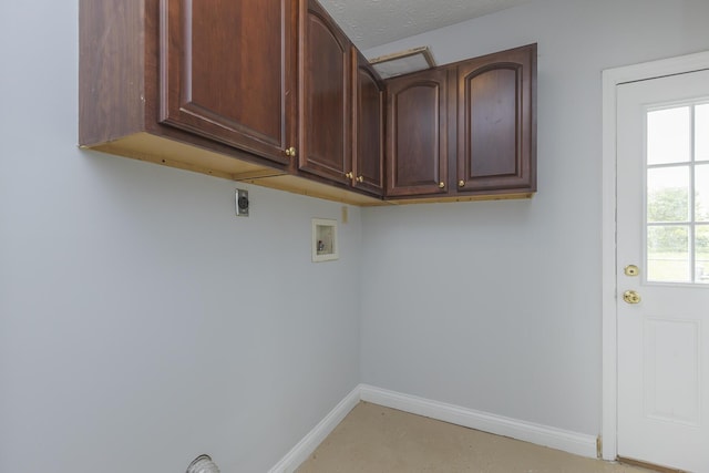 256 Sutton Ln, Lancaster, KY 40444 - clothes washing area with cabinet space, electric dryer hookup, baseboards, and washer hookup