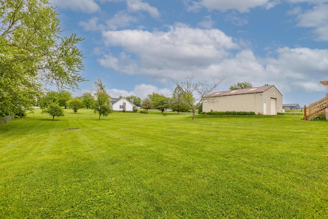 256 Sutton Ln, Lancaster, KY 40444 - view of grassy yard featuring a pole building and an outbuilding