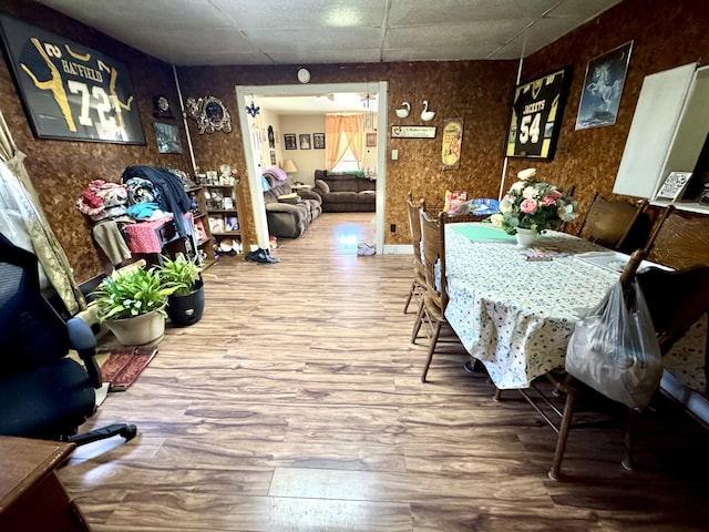 112 Exeter Ave, Middlesboro, KY 40965 - dining room featuring wood finished floors and a drop ceiling