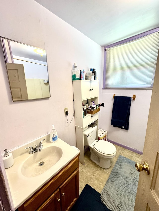 112 Exeter Ave, Middlesboro, KY 40965 - half bath featuring toilet, tile patterned floors, and vanity