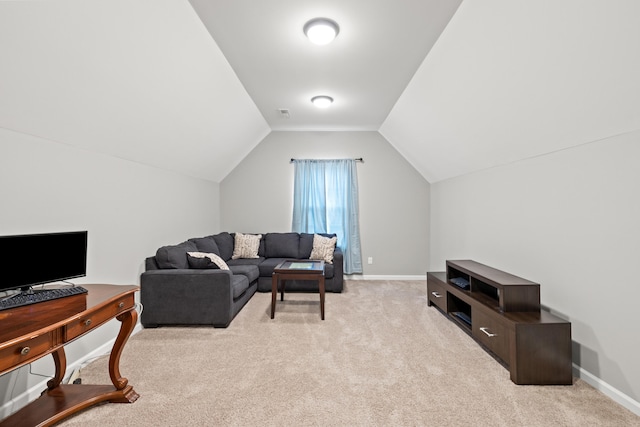 living area featuring visible vents, light colored carpet, baseboards, and lofted ceiling