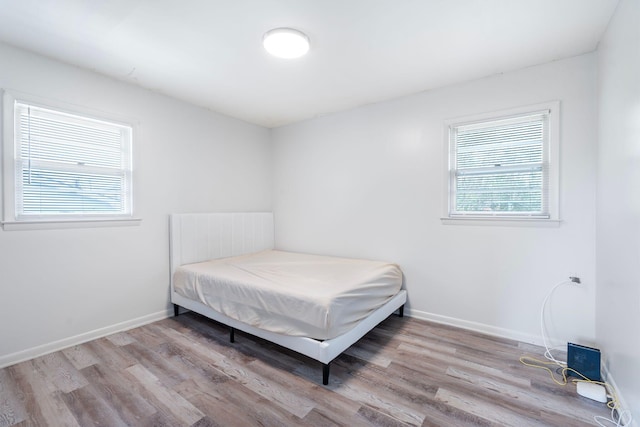 2429 Mirahill Dr, Lexington, KY 40509 - bedroom featuring baseboards and wood finished floors
