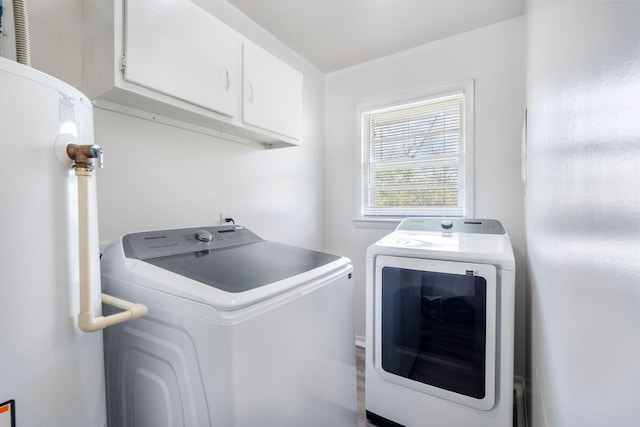 2429 Mirahill Dr, Lexington, KY 40509 - clothes washing area with washing machine and dryer and cabinet space