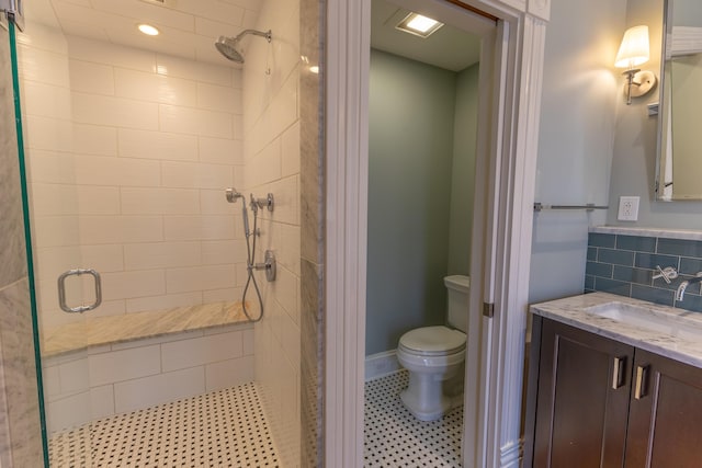 261 N Broadway, Lexington, KY 40507 - bathroom featuring a stall shower, toilet, and vanity