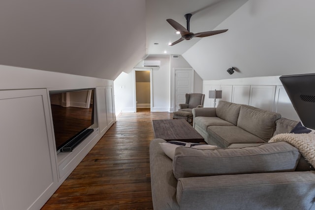 261 N Broadway, Lexington, KY 40507 - living area featuring a wall unit AC, dark wood-style flooring, a ceiling fan, and vaulted ceiling