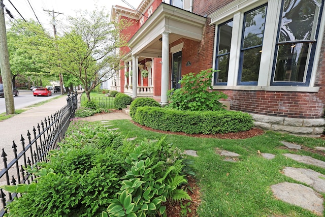 261 N Broadway, Lexington, KY 40507 - entrance to property featuring brick siding and a porch