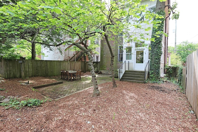 261 N Broadway, Lexington, KY 40507 - fenced backyard featuring entry steps