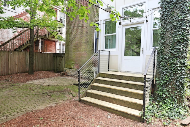 261 N Broadway, Lexington, KY 40507 - view of exterior entry featuring brick siding and a patio area