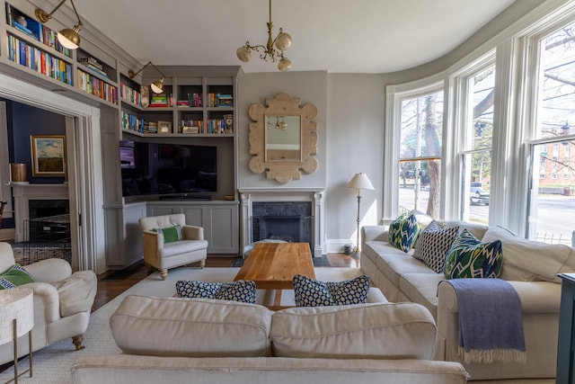 261 N Broadway, Lexington, KY 40507 - living room with a premium fireplace, healthy amount of natural light, and wood finished floors