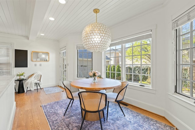 dining area with baseboards, light wood-style flooring, wood ceiling, and recessed lighting