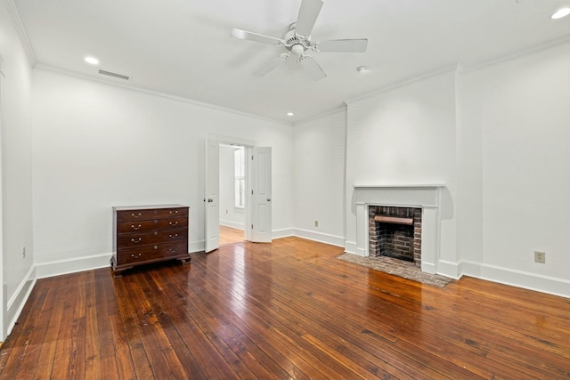 unfurnished living room featuring a ceiling fan, a fireplace, wood-type flooring, baseboards, and visible vents