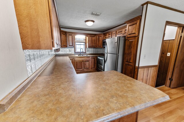 11 Hominy Hill Rd, Nancy, KY 42544 - kitchen with visible vents, crown molding, a textured ceiling, and appliances with stainless steel finishes