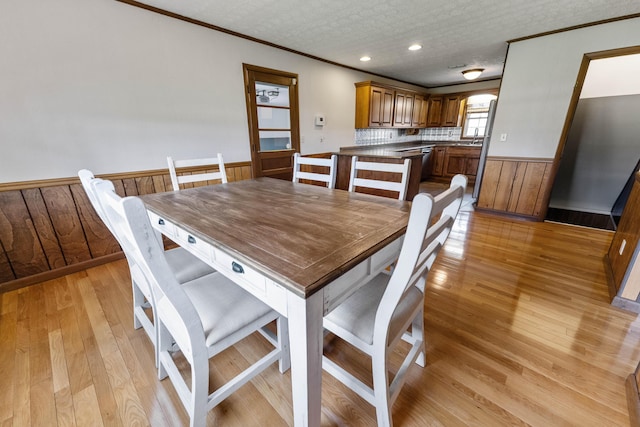 11 Hominy Hill Rd, Nancy, KY 42544 - dining room with crown molding, recessed lighting, wainscoting, and light wood finished floors