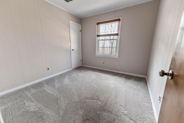 11 Hominy Hill Rd, Nancy, KY 42544 - unfurnished room featuring crown molding, baseboards, and carpet