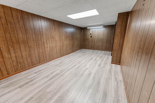 11 Hominy Hill Rd, Nancy, KY 42544 - finished basement featuring wood walls, a drop ceiling, and light wood-type flooring