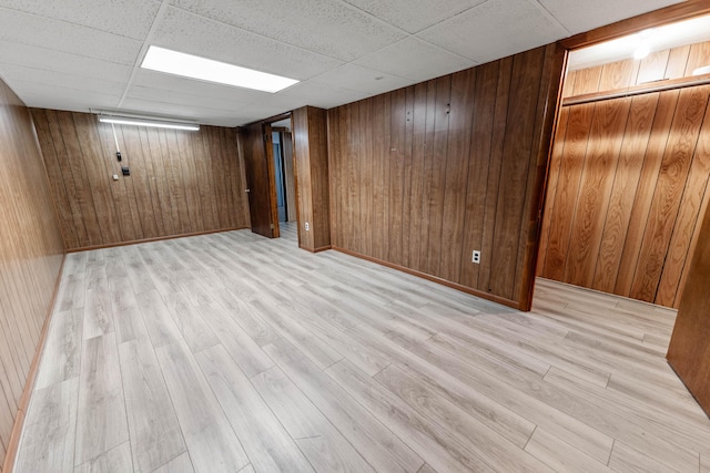 11 Hominy Hill Rd, Nancy, KY 42544 - finished below grade area with wood walls, light wood-type flooring, and a paneled ceiling