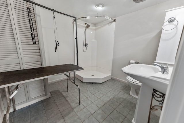 11 Hominy Hill Rd, Nancy, KY 42544 - bathroom featuring baseboards, tile patterned floors, toilet, and a shower stall