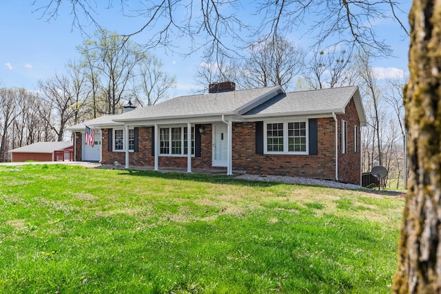 11 Hominy Hill Rd, Nancy, KY 42544 - single story home featuring roof with shingles, a chimney, a front yard, and brick siding