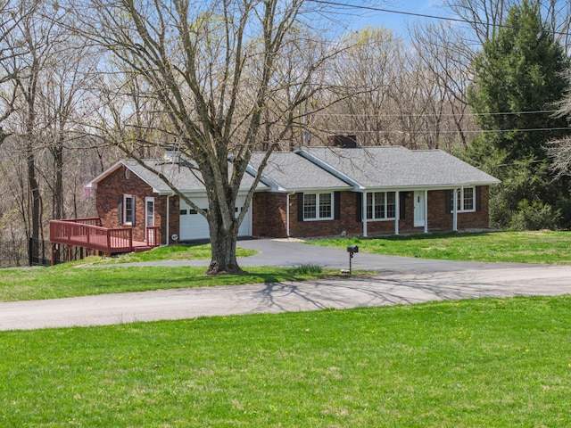 11 Hominy Hill Rd, Nancy, KY 42544 - ranch-style home with brick siding, a garage, a front lawn, and aphalt driveway