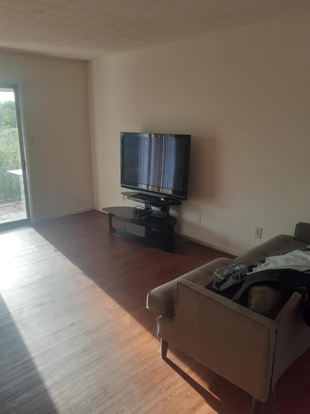 1281 Village Dr Unit C-9, Lexington, KY 40504 - living room with baseboards and wood finished floors