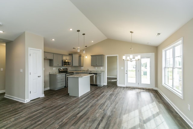 160 Bueno Xing, Georgetown, KY 40324 - kitchen featuring stainless steel appliances, gray cabinetry, a chandelier, dark wood-style flooring, and a kitchen island