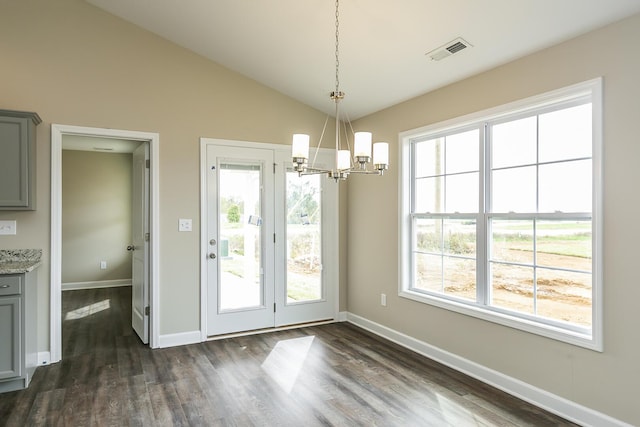 160 Bueno Xing, Georgetown, KY 40324 - unfurnished dining area featuring a chandelier, baseboards, dark wood finished floors, plenty of natural light, and vaulted ceiling