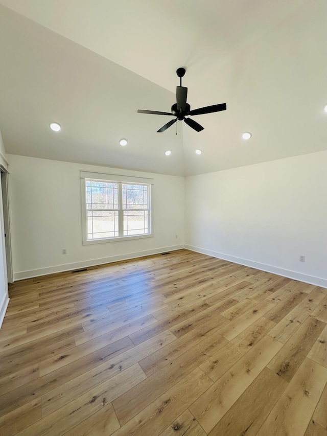 217 Dogwood Ln, Somerset, KY 42503 - spare room featuring baseboards, ceiling fan, light wood-style flooring, and vaulted ceiling