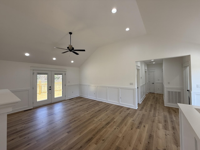 217 Dogwood Ln, Somerset, KY 42503 - unfurnished living room with vaulted ceiling, french doors, a ceiling fan, wood finished floors, and visible vents