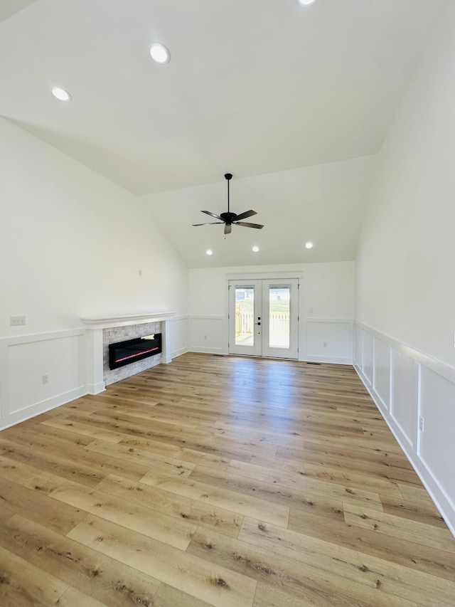 217 Dogwood Ln, Somerset, KY 42503 - unfurnished living room featuring lofted ceiling, recessed lighting, ceiling fan, light wood-style flooring, and a glass covered fireplace