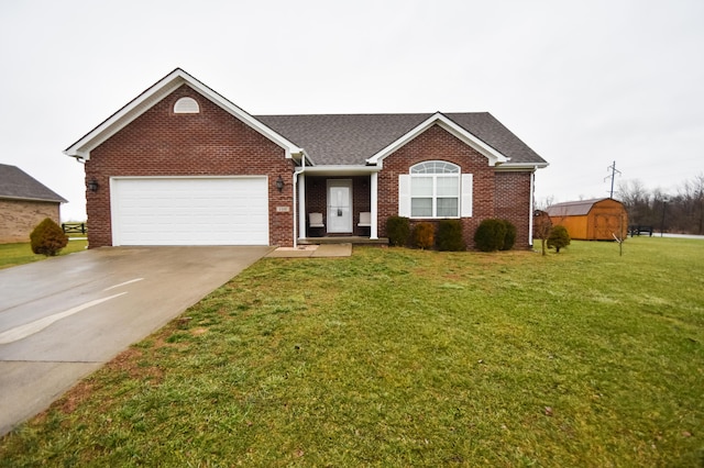 100 Twin Lakes Dr, Richmond, KY 40475 - single story home featuring driveway, a front lawn, brick siding, a garage, and a storage shed