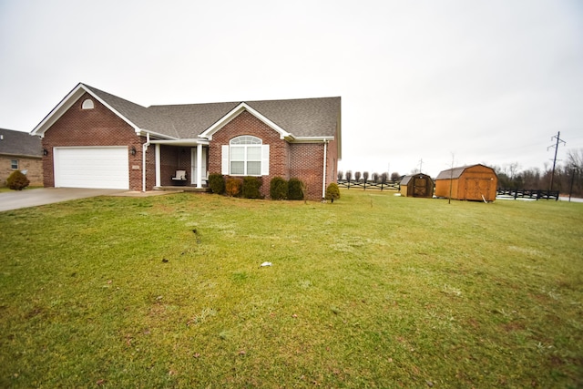 100 Twin Lakes Dr, Richmond, KY 40475 - single story home featuring concrete driveway, a shed, an attached garage, brick siding, and a front lawn