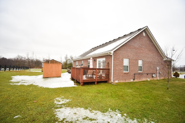 100 Twin Lakes Dr, Richmond, KY 40475 - rear view of house featuring crawl space, brick siding, an outdoor structure, a yard, and a shed