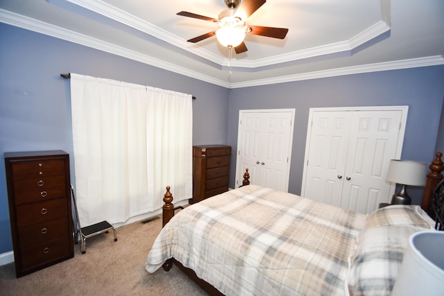 100 Twin Lakes Dr, Richmond, KY 40475 - bedroom with ornamental molding, multiple closets, carpet floors, visible vents, and a ceiling fan