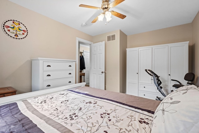 bedroom with visible vents and ceiling fan