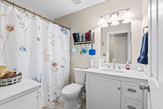 bathroom with toilet, curtained shower, visible vents, and vanity
