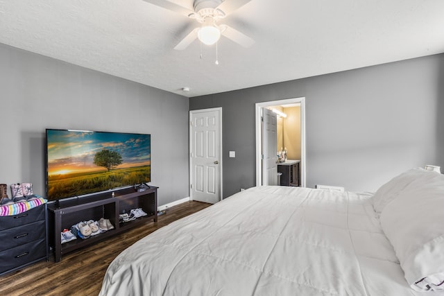135 Country Acres Dr, Somerset, KY 42503 - bedroom with baseboards, ceiling fan, a textured ceiling, connected bathroom, and wood finished floors