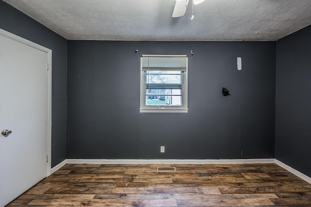 140 Wonder St, Lewisburg, KY 42256 - unfurnished room with wood finished floors, a textured ceiling, ceiling fan, and baseboards