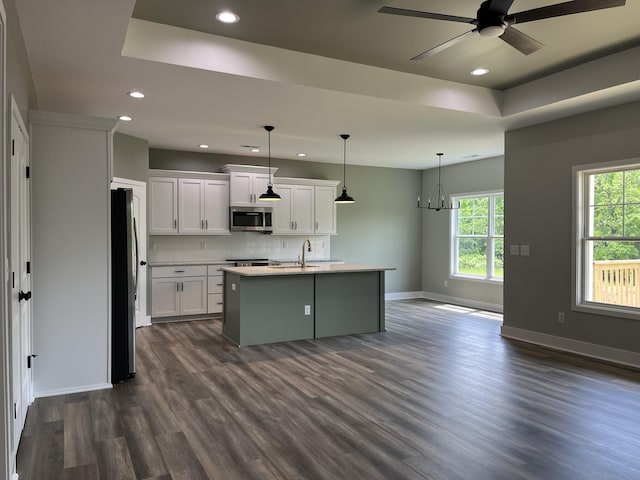 168 Bueno Xing, Georgetown, KY 40324 - kitchen with stainless steel appliances, baseboards, dark wood-style floors, recessed lighting, and light countertops