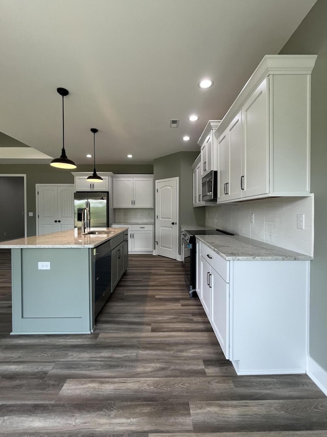168 Bueno Xing, Georgetown, KY 40324 - kitchen with appliances with stainless steel finishes, recessed lighting, white cabinetry, an island with sink, and a sink