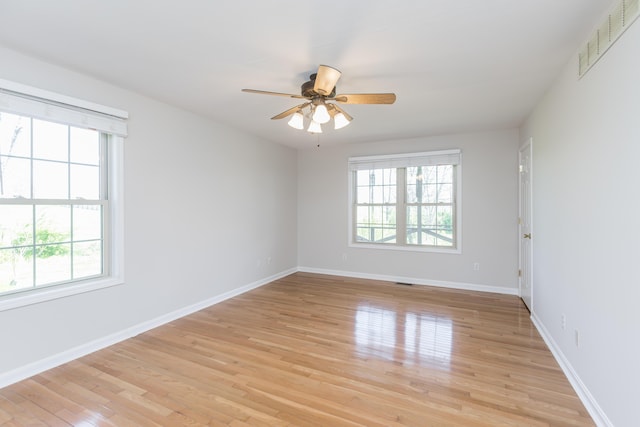 2692 Crab Orchard Rd, Lancaster, KY 40444 - unfurnished room featuring baseboards, a ceiling fan, visible vents, and light wood-style floors