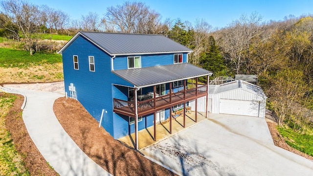 1600 Puncheon Creek Rd, Lawrenceburg, KY 40342 - view of front facade featuring an outbuilding, metal roof, and a garage