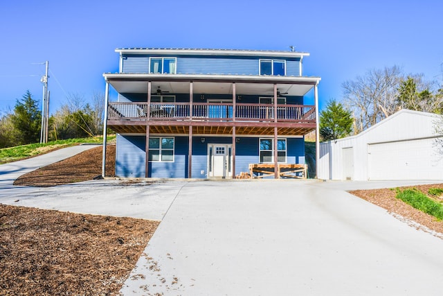 1600 Puncheon Creek Rd, Lawrenceburg, KY 40342 - view of front of home featuring a ceiling fan, an outdoor structure, a wooden deck, and a detached garage