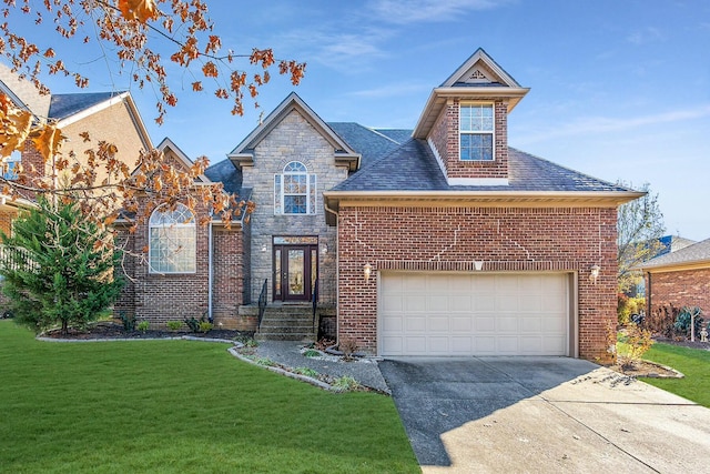 traditional home with a front yard, stone siding, brick siding, and concrete driveway