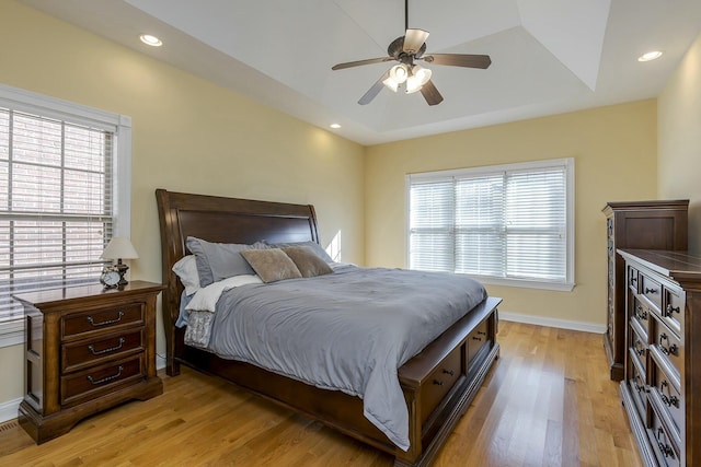 bedroom featuring light wood-type flooring, ceiling fan, baseboards, and recessed lighting