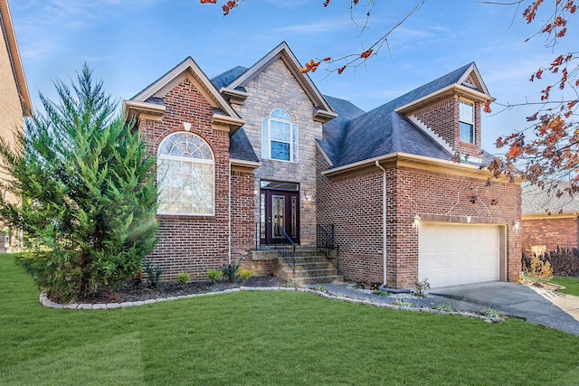 traditional home featuring a garage, roof with shingles, a front lawn, brick siding, and driveway