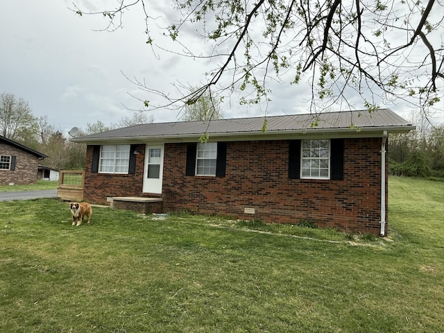 81 Central Union Rd, Albany, KY 42602 - single story home featuring a front lawn, metal roof, and brick siding