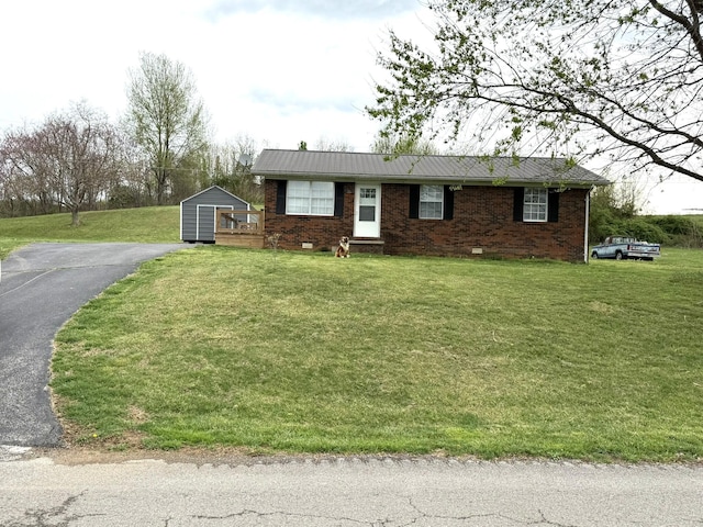 81 Central Union Rd, Albany, KY 42602 - ranch-style home featuring brick siding, a front lawn, and an outdoor structure