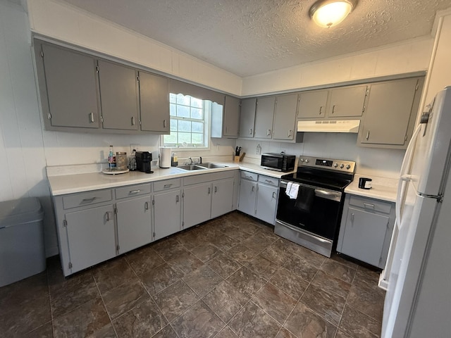 81 Central Union Rd, Albany, KY 42602 - kitchen with under cabinet range hood, gray cabinetry, a sink, stainless steel range with electric cooktop, and freestanding refrigerator
